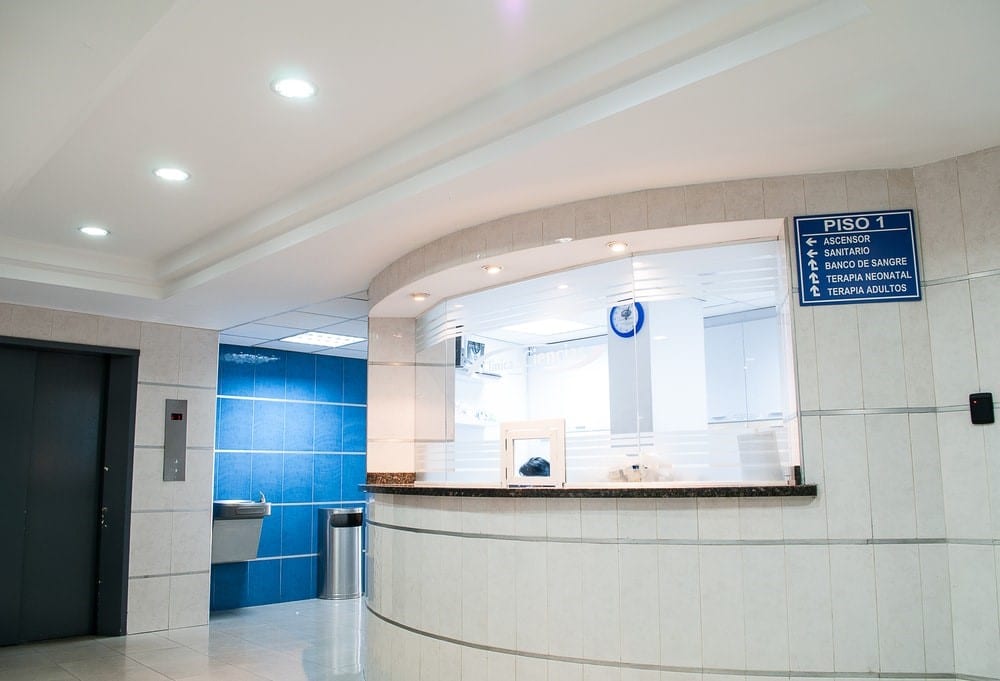 Best Flooring Options For Hospitals In 2024 2 white concrete counter stand
