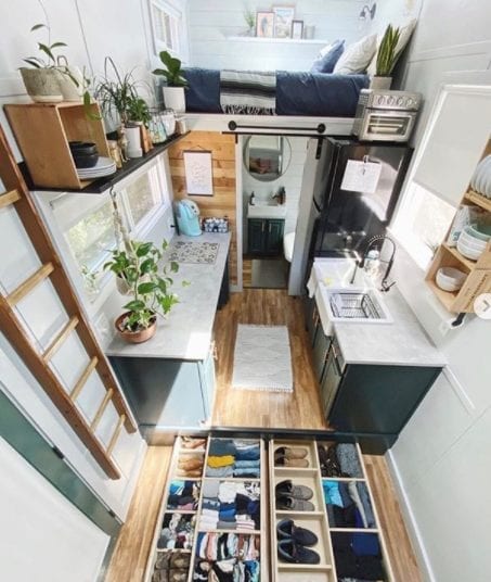 3 Flooring Choices for Small Homes 1 A tiny home featuring living, dining, and storage areas.