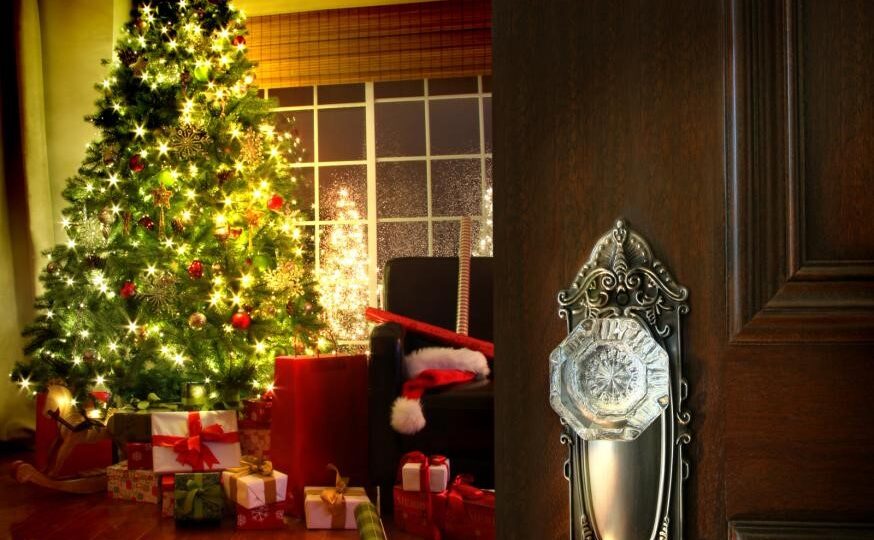 Protecting Floors From Your Christmas Tree 1 Door opening to Christmas tree with gifts